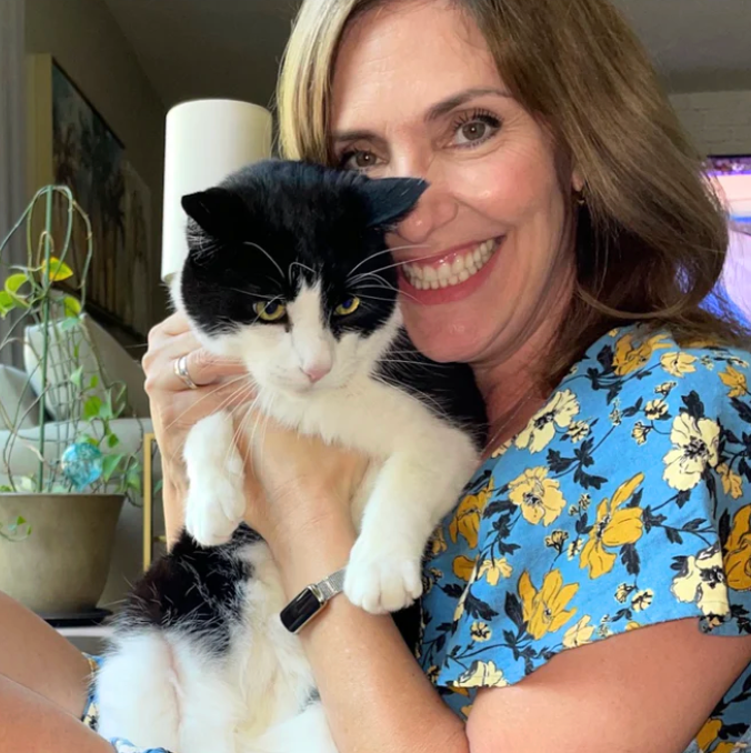 Michelle with her cat, Tommy.