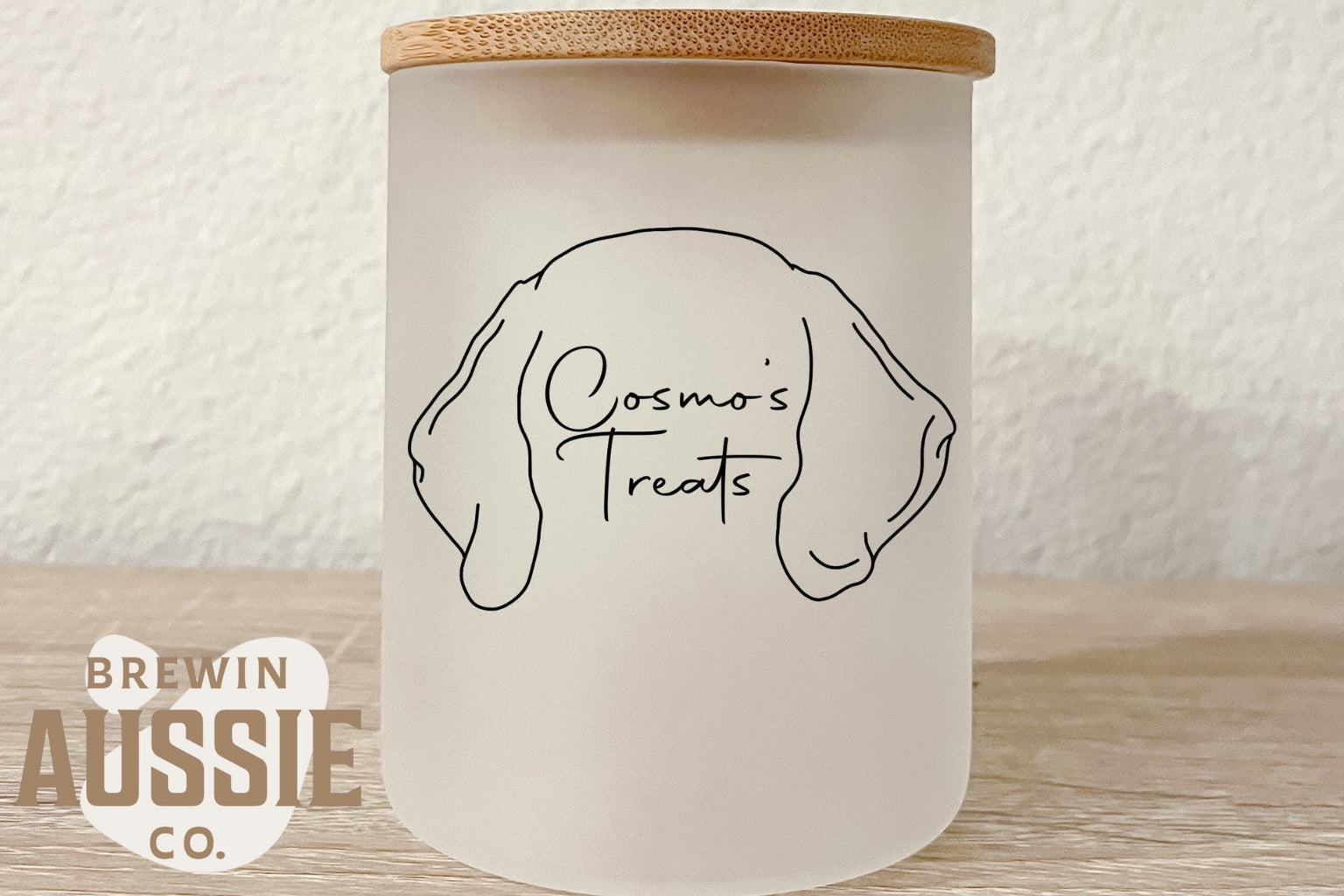 dog treat jar with dog ears drawn on it