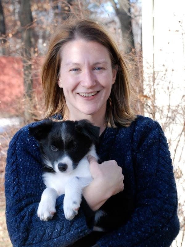 Julia Lane, author and professional dog trainer, with her new puppy